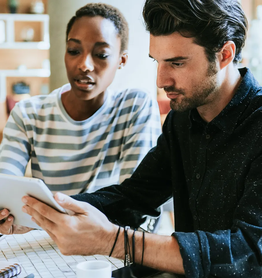Couple looking at the tablet